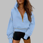 Aarenza women's hooded sweatshirt with half zip, cozy fall clothing in soft fabric, featuring a hood and casual style.