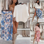 A woman wearing a cream crew neck top and printed belted skirt set by Arenzza, styled for casual or everyday wear.
