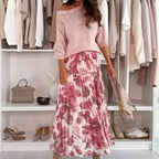 Aarenza crew neck top and printed belted skirt set, stylish clothing ensemble featuring a matching top and skirt with floral print.