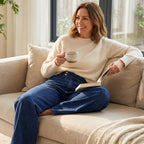 A pair of women's high-waist wide-leg jeans from Arenzza, featuring a relaxed fit and classic denim style.