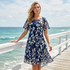 Aarenza short sleeve A-line knee-length party dress in vibrant fabric, perfect for special occasions and evening events.
