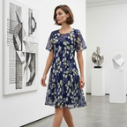 Aarenza short sleeve A-line knee-length party dress in vibrant fabric, perfect for elegant occasions and festive events.