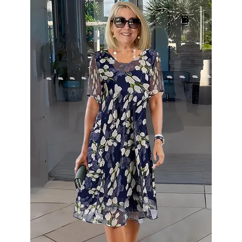 Aarenza short sleeve A-line knee-length party dress in vibrant fabric, displayed on a hanger with a fitted waist and flared skirt.