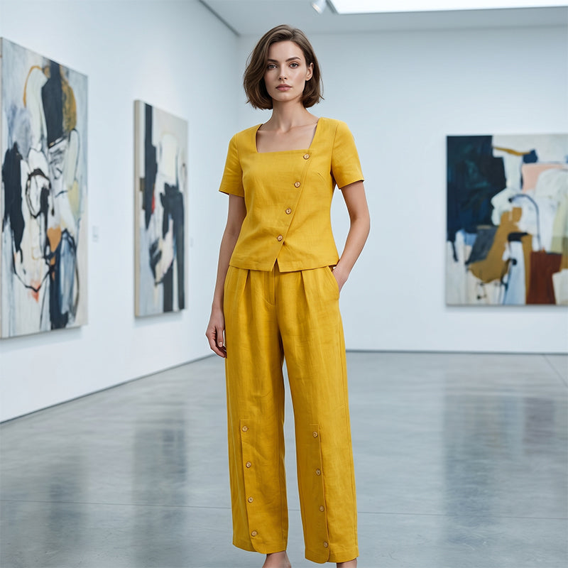 Arenzza stylish clothing set featuring an asymmetrical square neckline top and wide-leg pants, in a modern, fashionable design.