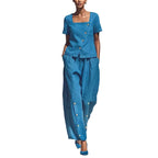 Aarenza stylish clothing set with an asymmetrical square neckline top and wide-leg pants in a modern, trendy design.