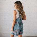 Vintage floral printed denim jumpsuit by Arenzza featuring a stylish 2025 fashion design, with a vibrant floral pattern and classic denim fabric.
