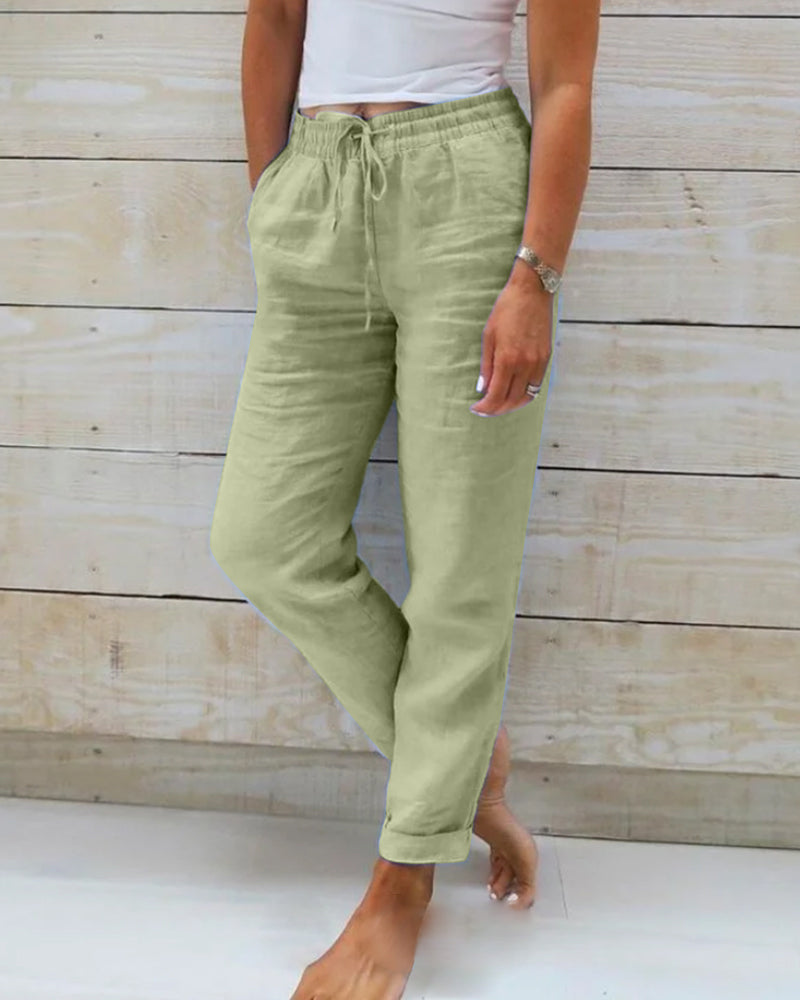 Women's elastic waist cotton linen wide-leg pants by Arenzza, shown in natural fabric texture and relaxed fit.