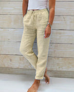 Women's cotton linen wide-leg pants with elastic waistband by Arenzza, shown in a relaxed fit and natural fabric texture.