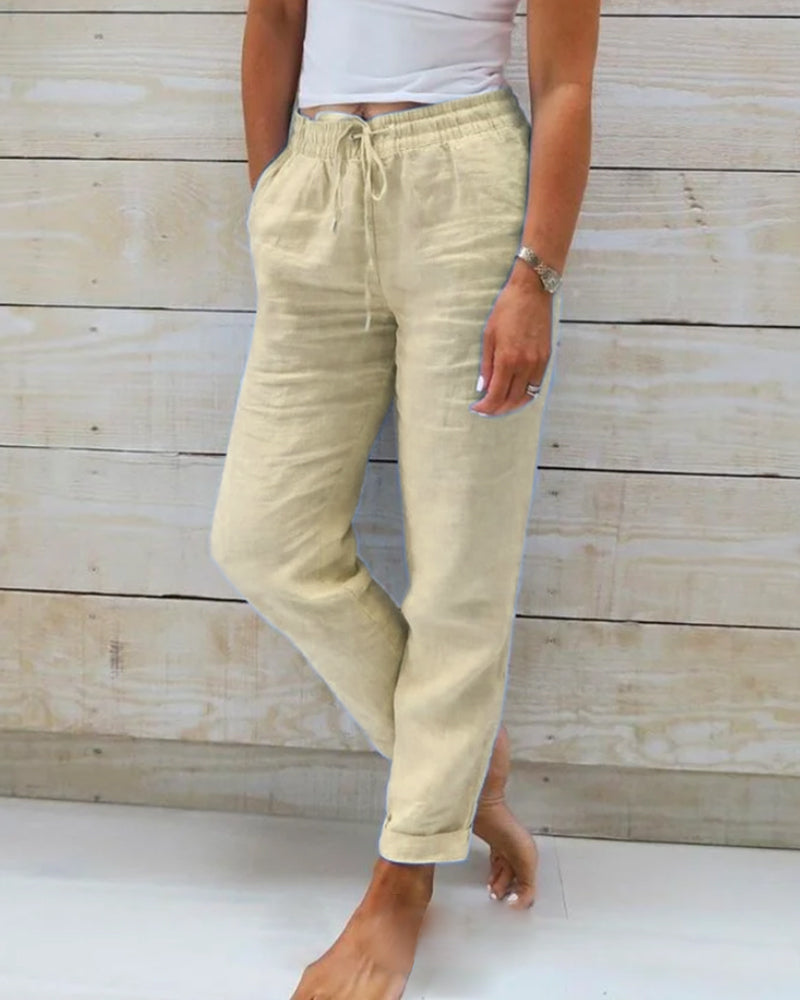 Women's cotton linen wide-leg pants with elastic waistband by Arenzza, shown in a relaxed fit and natural fabric texture.