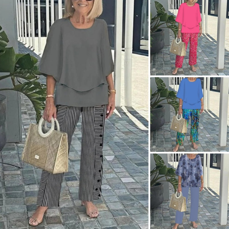 Arenzza women's casual two-piece set with printed top and matching pants, featuring a round neck and half sleeves.
