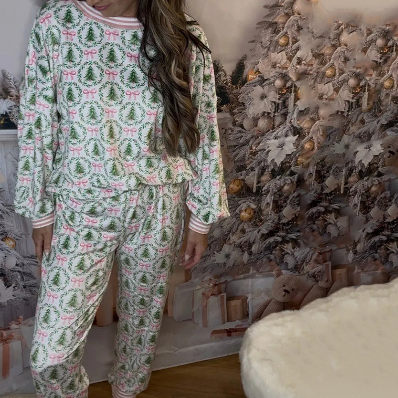 Arenzza cozy Christmas long-sleeve top and pants set for women, featuring festive holiday patterns in red and green.