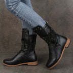 A pair of Arenzza women's lace-up ankle boots with low heels and round toes, made of black leather, displayed on a neutral background.