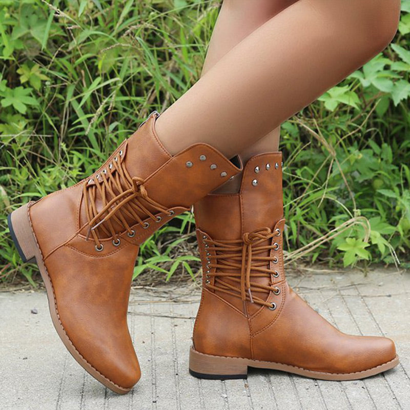 Arenzza women's lace-up ankle boots with a low heel and round toe, featuring stylish design and ankle-length silhouette.