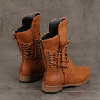 Women’s Arenzza lace-up low-heel ankle boots with round toe and stylish design, shown on a model.