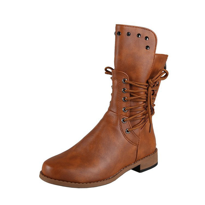 A pair of Arenzza women’s lace-up low-heel ankle boots with round toes in black leather, stylish and comfortable footwear.