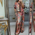 Arenzza women's printed top and wide-leg pants 2-piece set, stylish clothing with floral print and relaxed fit, displayed on a model.