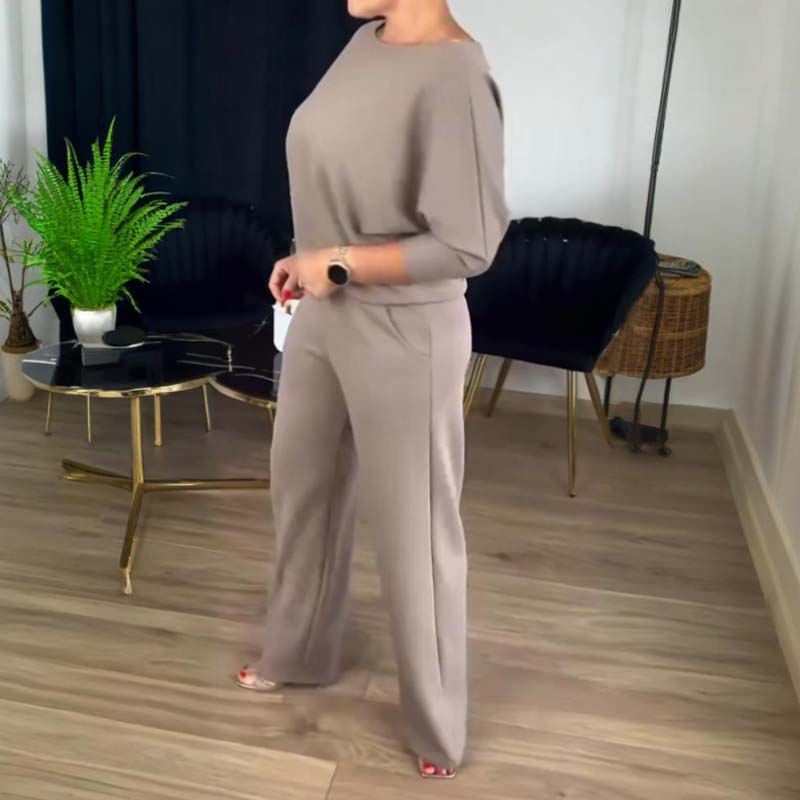 Arenzza 3-piece longline cardigan, top, and pants set featuring elegant, stylish clothing for women, displayed on a model.