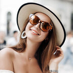A pair of oversized cat eye sunglasses by Arenzza with polarized lenses and UV400 protection, featuring a stylish design.