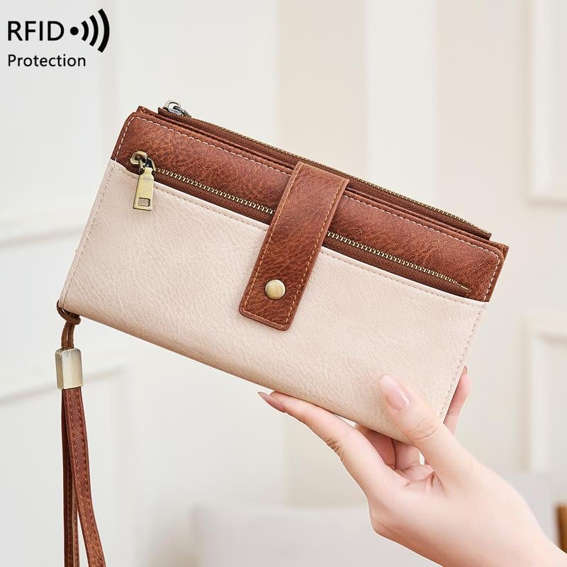A women's RFID blocking leather wallet from Arenzza with multiple card slots and a sleek, compact design.