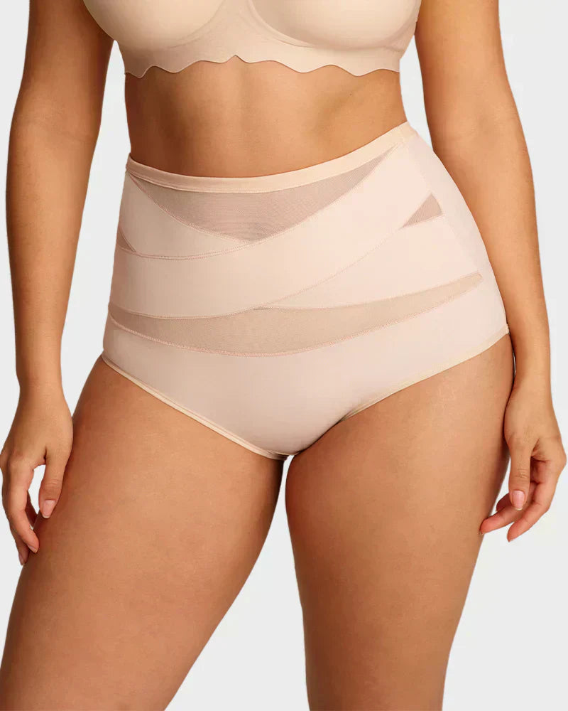 A nude plus-size high-waist cross tummy control panties by Arenzza, showing the stretchy, supportive fabric design.