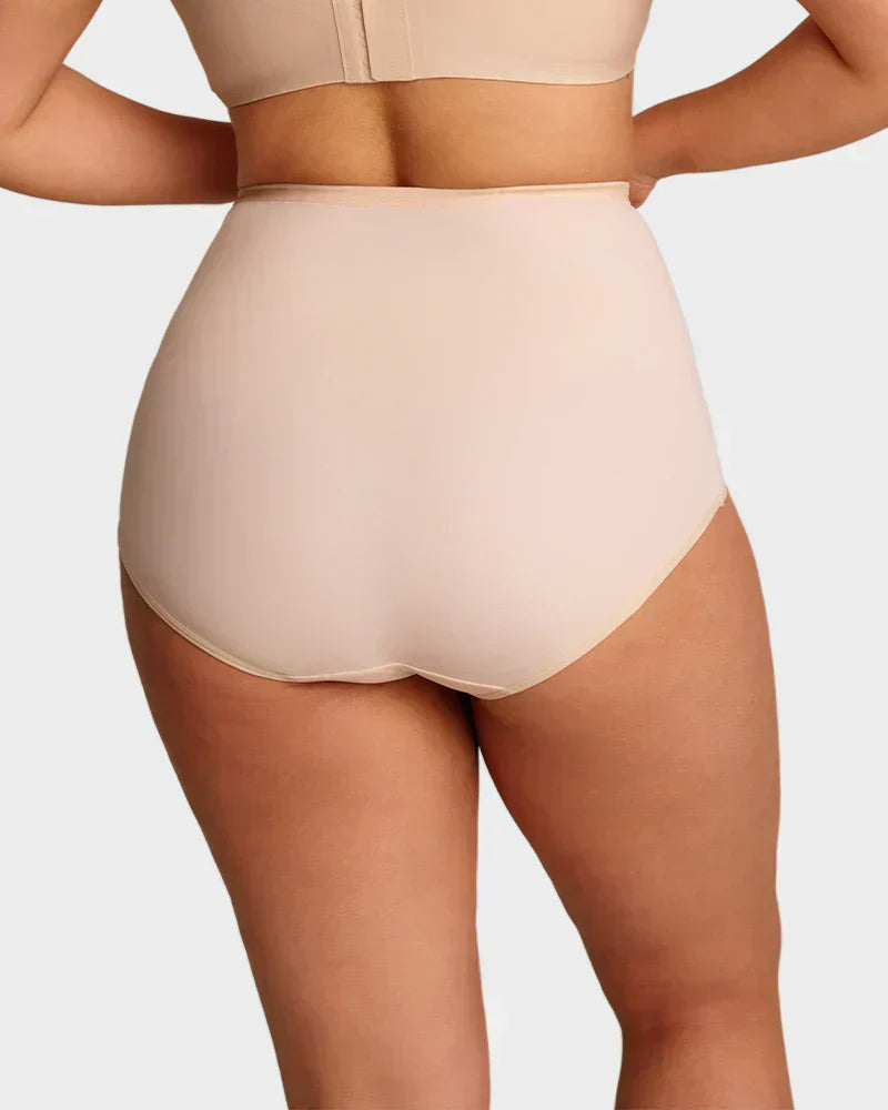 A nude plus-size high-waist cross-tummy control panties from Arenzza, designed to shape and smooth the waist area.