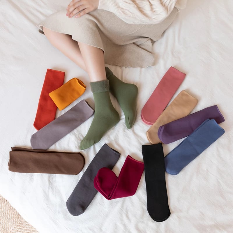 A pair of Arenzza Snugly Winter Thermal Socks in cozy knit, perfect for cold weather, displayed in a close-up shot.