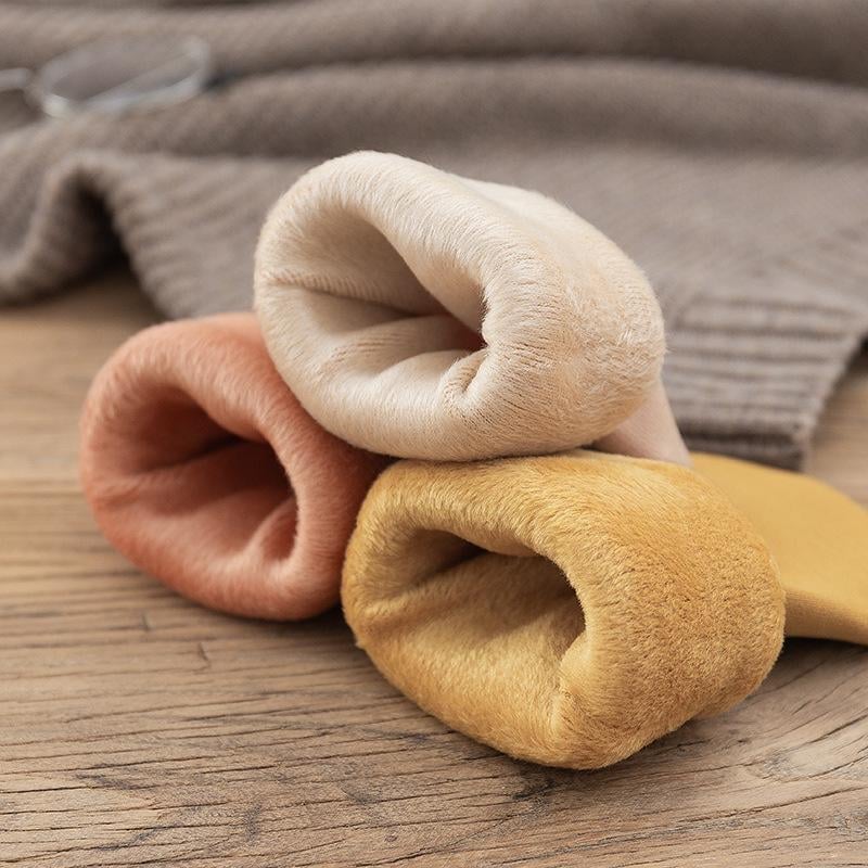 A pair of Arenzza winter thermal socks with a cozy, snug design in warm colors, ideal for cold weather wear.