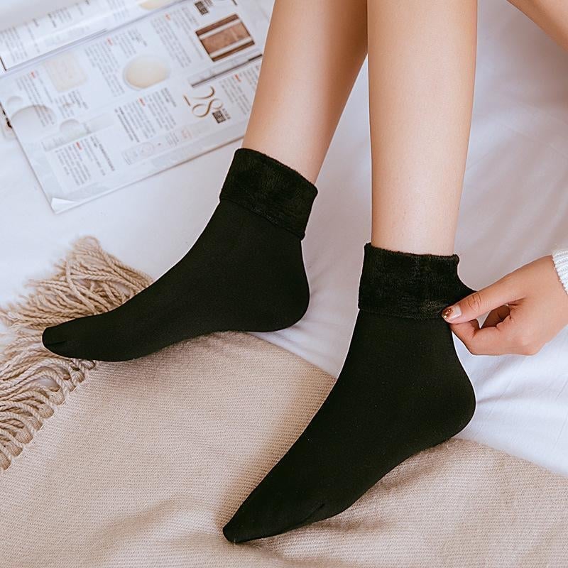 A pair of Arenzza Snugly Winter Thermal Socks in cozy, warm fabric ideal for cold weather, shown in natural color.