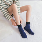 A pair of Arenzza Snugly Winter Thermal Socks in cozy knit, designed for warmth and comfort during cold weather.