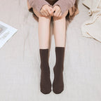 Arenzza winter thermal socks in cozy knitted fabric, designed for warmth and comfort during cold weather.