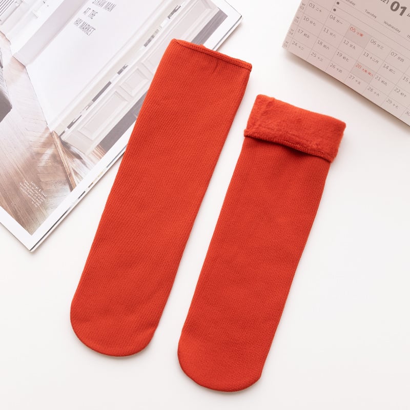 A pair of Arenzza Snugly Winter Thermal Socks in cozy, thick fabric designed for warmth and comfort during cold weather.