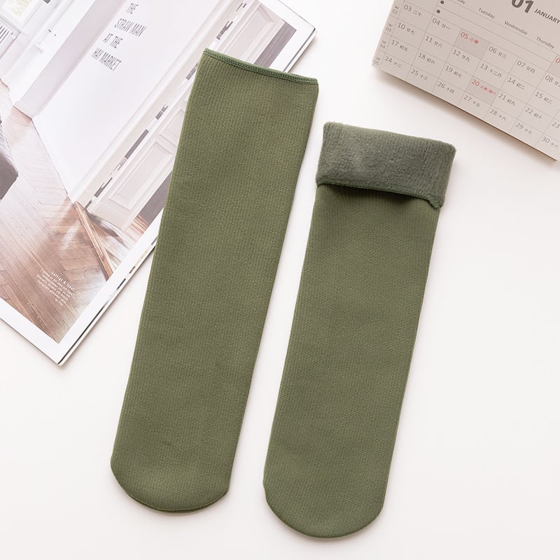 A pair of Arenzza Snugly Winter Thermal Socks in cozy, warm fabric, perfect for cold weather, shown in a close-up shot.