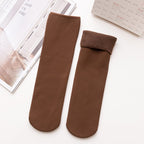 A pair of Arenzza Snugly Winter Thermal Socks in cozy knit, perfect for cold weather, with a festive floral pattern.