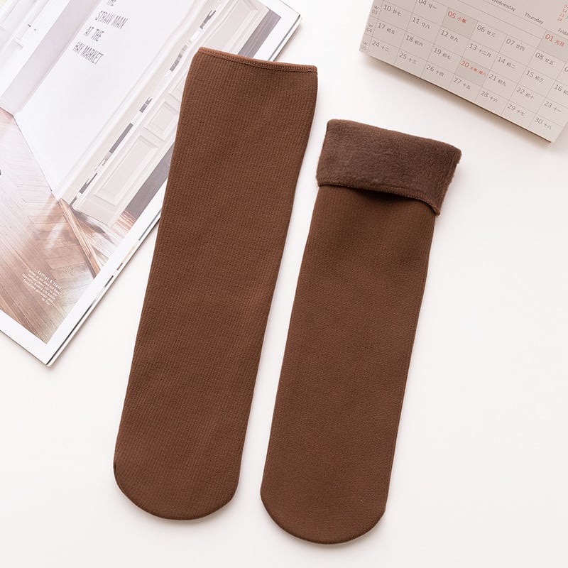A pair of Arenzza Snugly Winter Thermal Socks in cozy knit, perfect for cold weather, with a festive floral pattern.