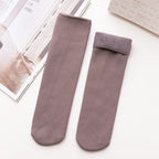 A pair of Arenzza winter thermal socks in cozy, warm fabric, perfect for cold weather, displayed in a close-up shot.
