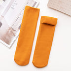 A pair of Arenzza winter thermal socks in cozy, warm fabric, perfect for cold weather and winter clothing.
