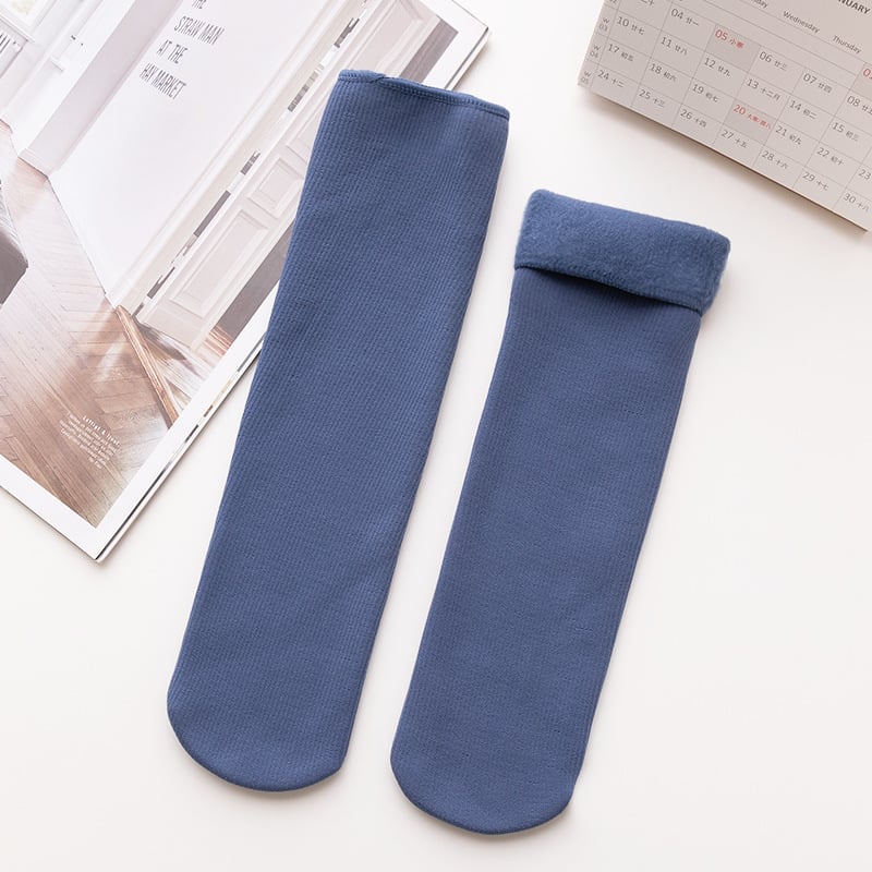 A pair of warm winter thermal socks from Arenzza, displayed in a bundle of five, designed for cozy cold-weather wear.