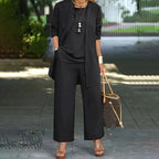 Elegant women’s relaxed fit 3-piece clothing set from Arenzza featuring minimalist wide-leg pants, cardigan, and top in luxe stretch fabric.