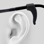 Arenzza anti-slip silicone ear hook for glasses, shown attached to clear eyeglasses with a flexible, secure fit for comfortable wear.