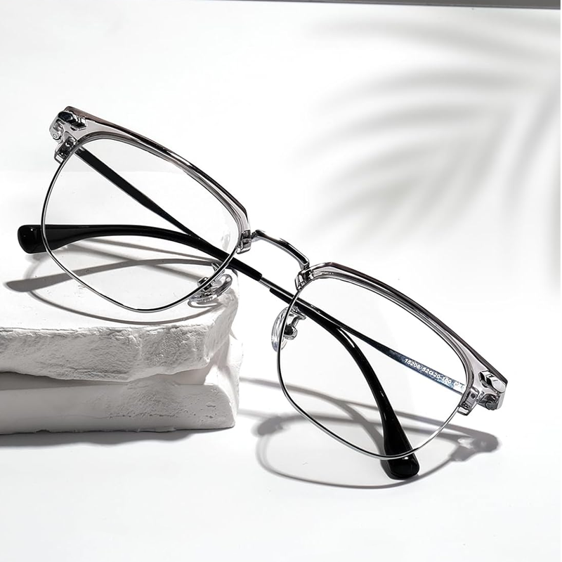 A pair of Arenzza fashion half frame eyewear with clear lenses and stylish black and gold accents, displayed on a white background.