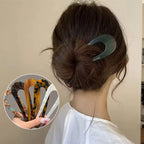 A pair of U-shape women hairpins from Arenzza, stylish hair clips for securing and styling hair accessories.