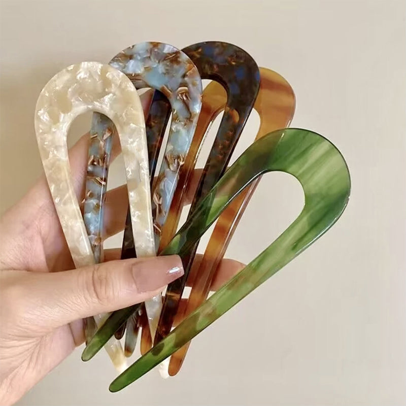 A set of U-shape women hairpins and hair clips from Arenzza, displayed on a neutral background.
