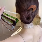 A pair of U-shape Arenzza women’s hairpins and hair clips with sleek, minimalist design for stylish hair styling accessories.