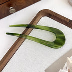 A pair of U-shape women hairpins by Arenzza, stylish hair clips made of metal, perfect for securing and accessorizing hair styles.