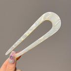 A pair of U-shaped women hairpins from Arenzza with sleek metal design, perfect for securing stylish hair in various updos.