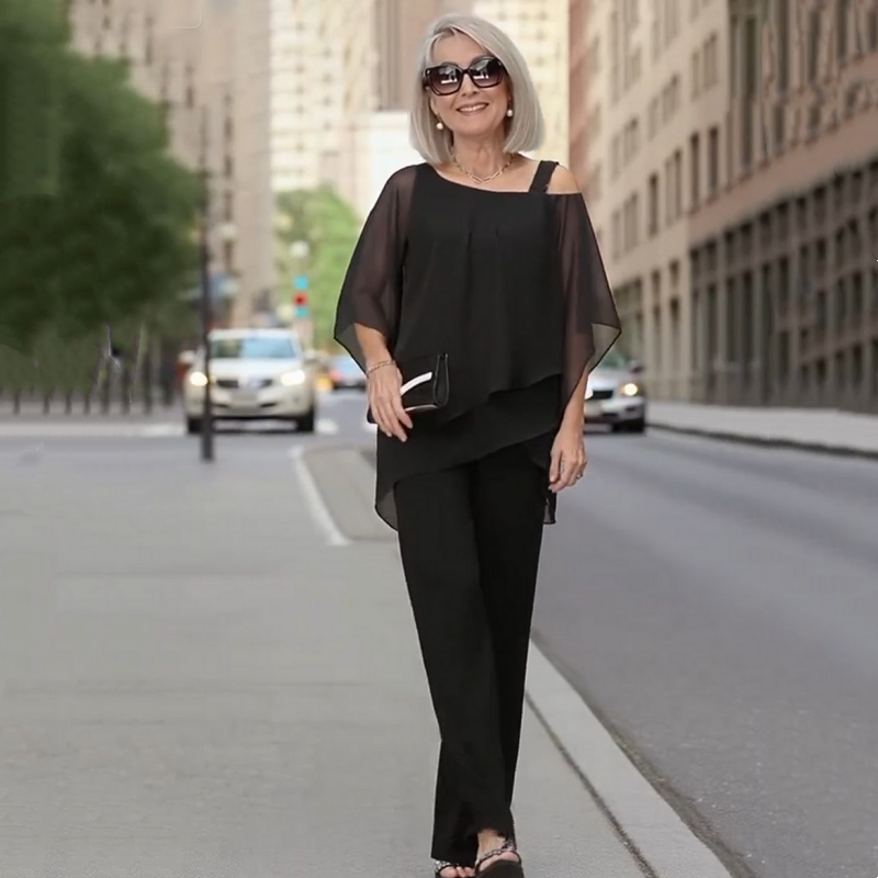 A women’s Arenzza 2-piece set with irregular chiffon top and wide-leg pants, featuring flowy fabric and stylish design.