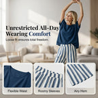 A woman wears Arenzza casual solid top and striped wide-leg pants, showcasing effortless weekend style and comfortable clothing.
