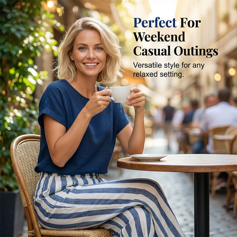 A woman wearing Arenzza casual solid top and striped wide-leg pants, showcasing effortless weekend style.