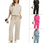 A woman wearing Arenzza women's soft casual top and pants set, featuring a relaxed fit in neutral colors, perfect for comfortable everyday wear.
