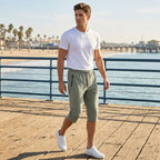 Men's Arenzza quick-dry athletic capri pants shown in black with elastic waistband and athletic fit for active wear.